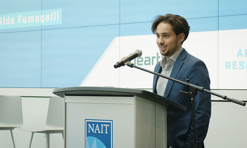 nait applied researcher aldo fumagalli presenting on research