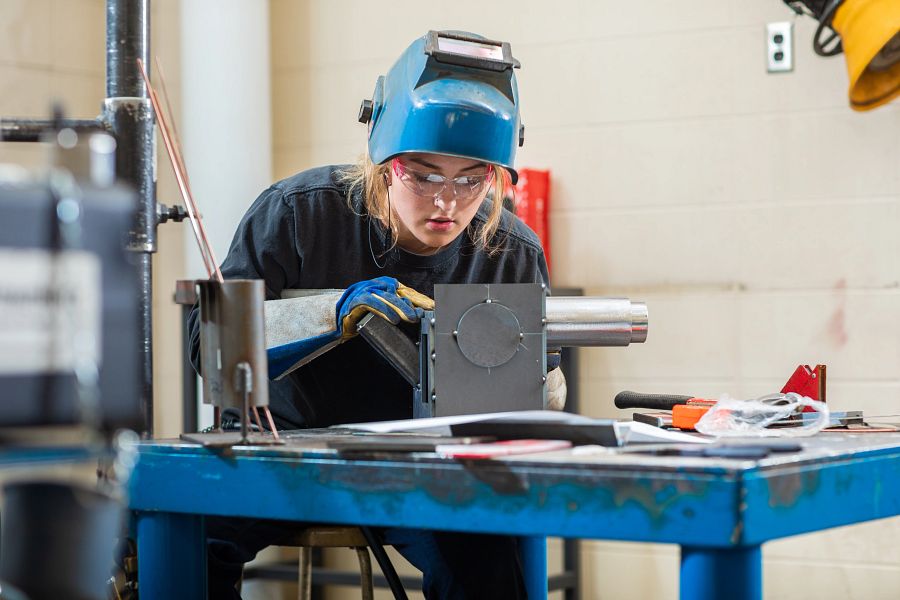 student competes in welding