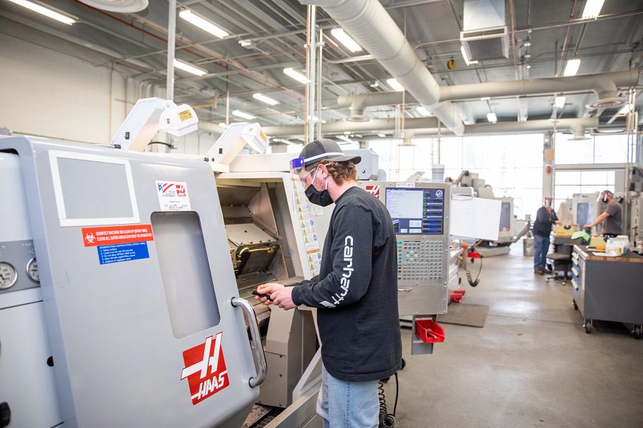 student competes in machining