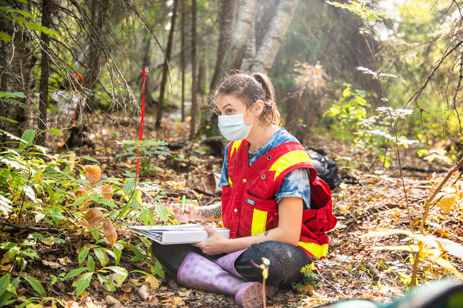 Female student conducts field work