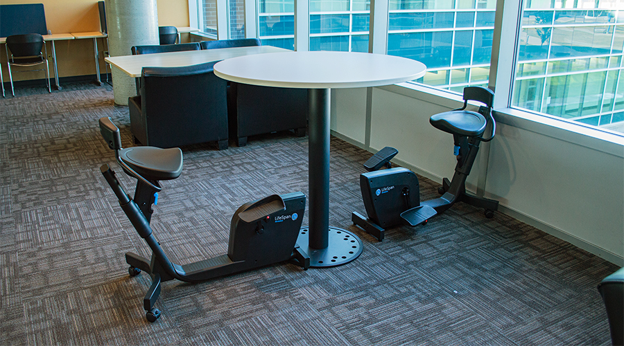 active study space at nait featuring desks with built in exercise bikes