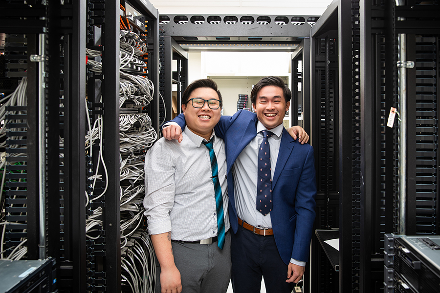 student friends in server room at NAIT network administrator program
