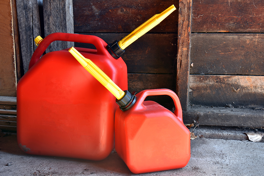 two red plastic gas cans
