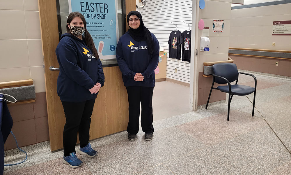 nait students yasmin lavoie-khatib and mariam arain at the popup store at the glenrose rehabilitation hospital