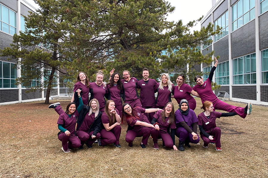 NAIT health sciences students in courtyard at NAIT campus
