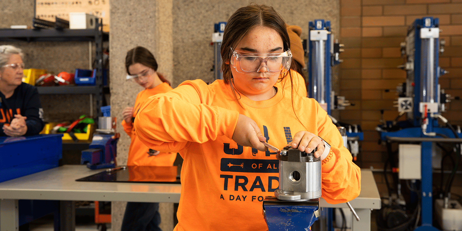 female high school student attends nait's jill of all trades event to learn about careers in the trades