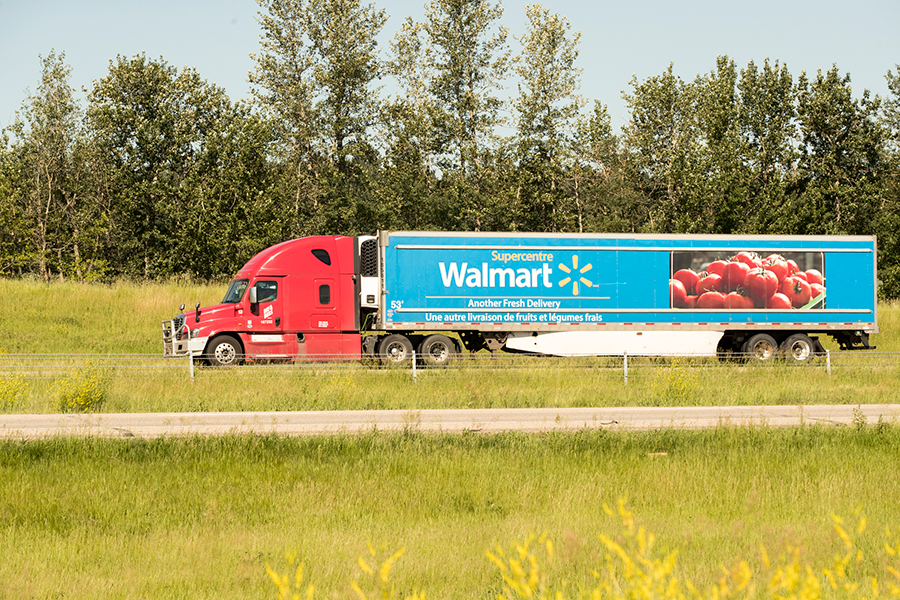 walmart transport truck parked at the side of a highway
